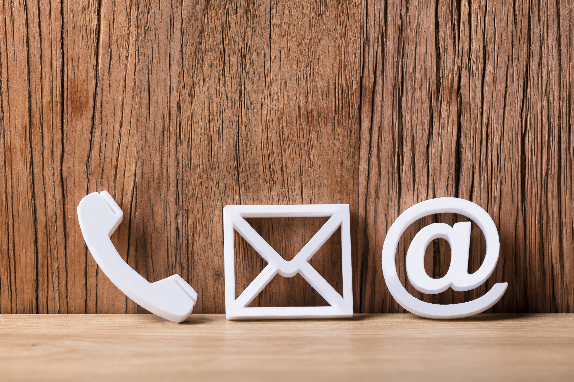Close-up Of  Phone, Email and Post Icons
